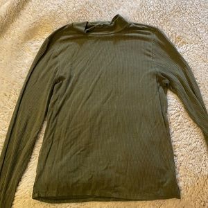 American Eagle Mock Neck atop